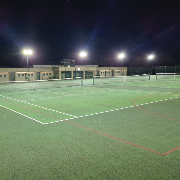 Witham Hall School extends sports facilities for evening and winter training on their new quad tennis court area!